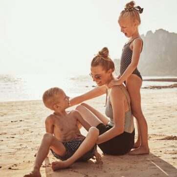 Mom and 2 kids on beach